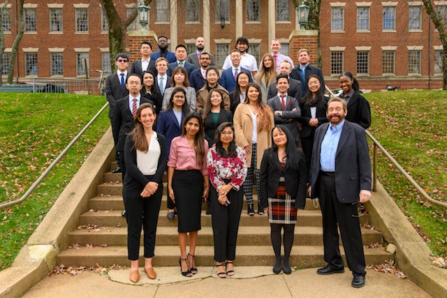 Students and faculty pose together in front of the Medical and Dental Building in Fall 2021