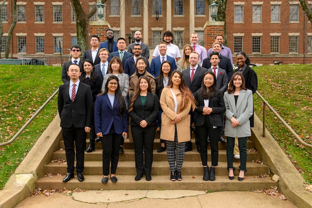 Students pose together in front of the Medical and Dental Building in Fall 2021