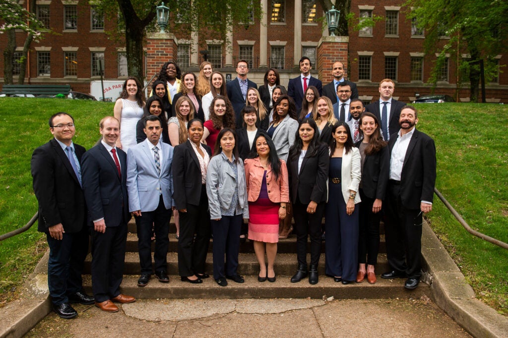 Students, faculty and staff pose outside of the Medical and Dental Building in Spring 2019