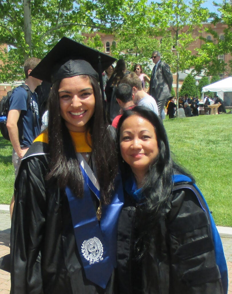 A graduating student with Dr. Simbulan-Rosenthal at 2016 Commencement