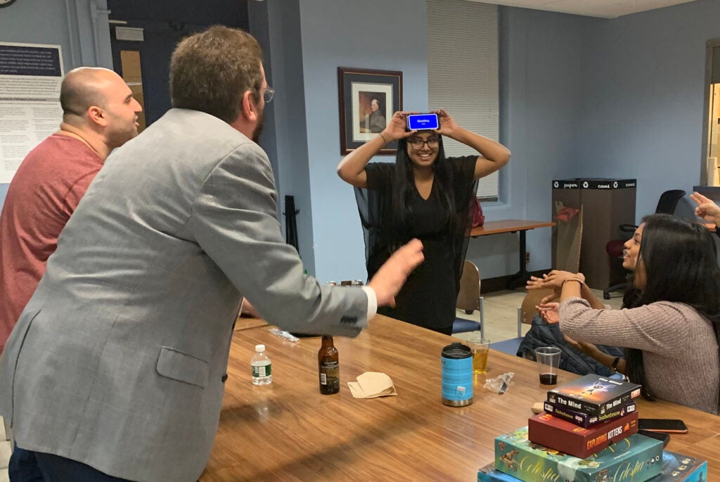 Attendees play a game at Thanksgiving 2019