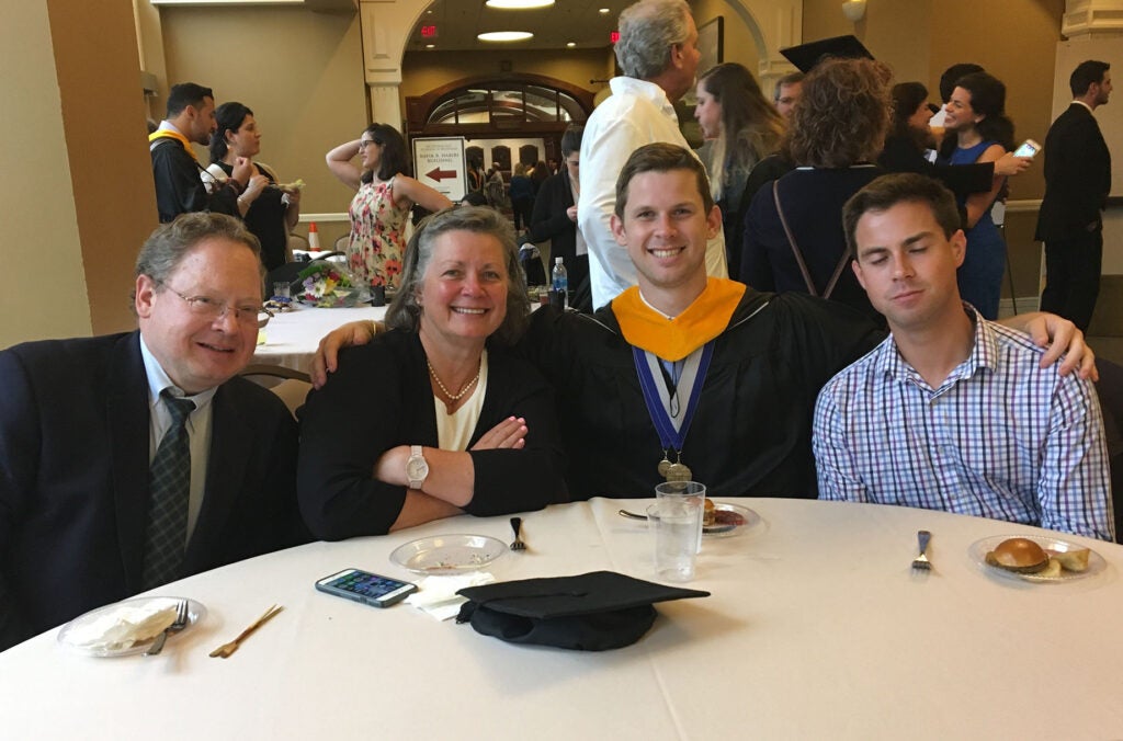 Students with family at 2018 Commencement