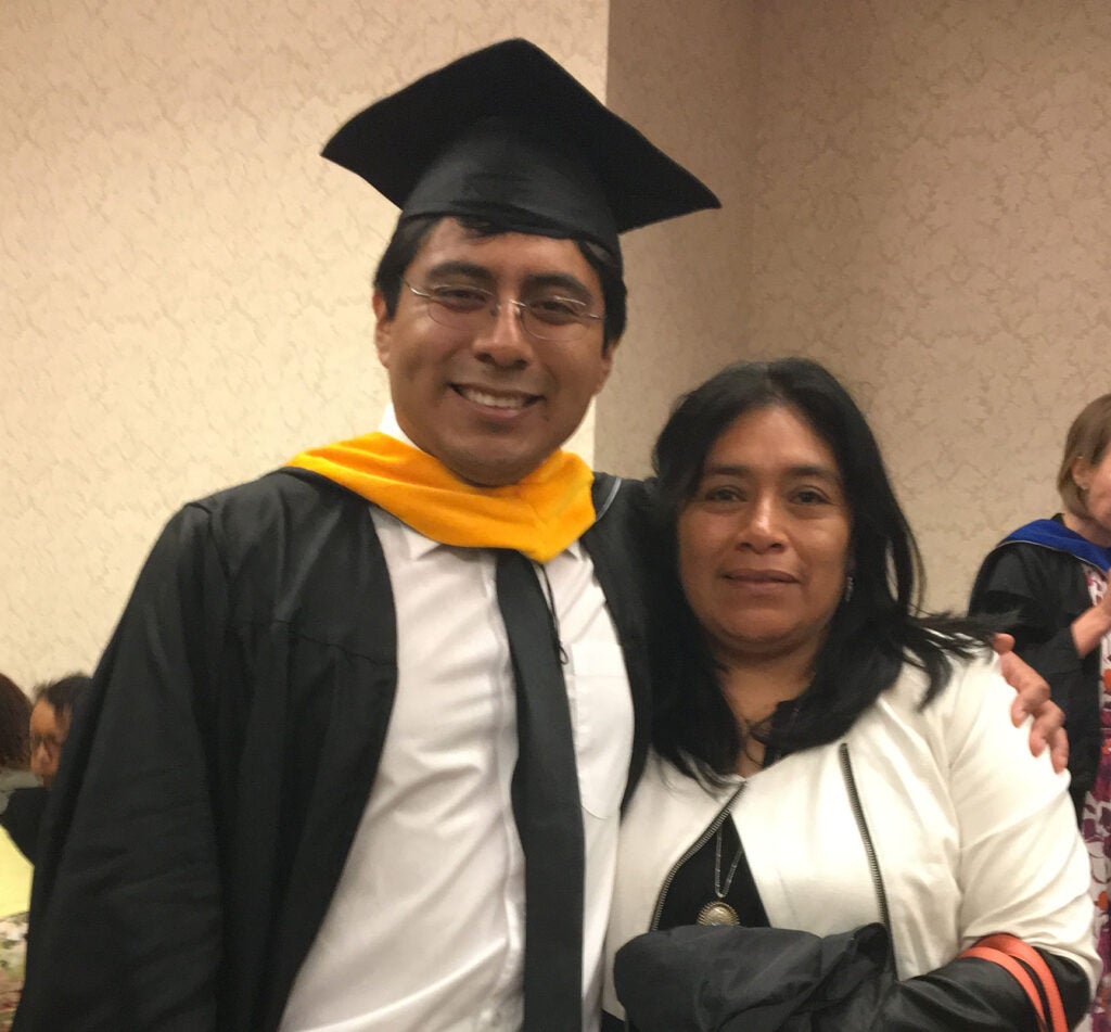 Students with family at 2018 Commencement