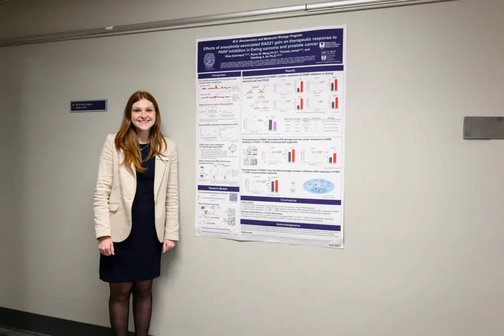 A student with poster presentation